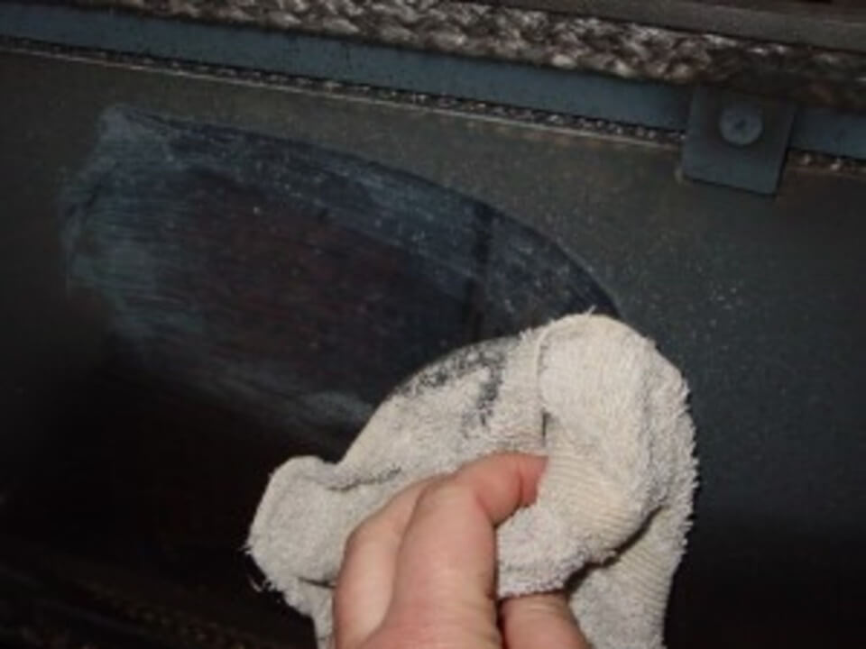 cleaning soot from wood stove